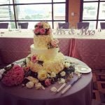 flowers around wedding cake