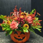 Halloween vase of fall flowers