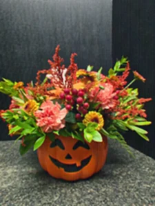 Halloween vase of fall flowers